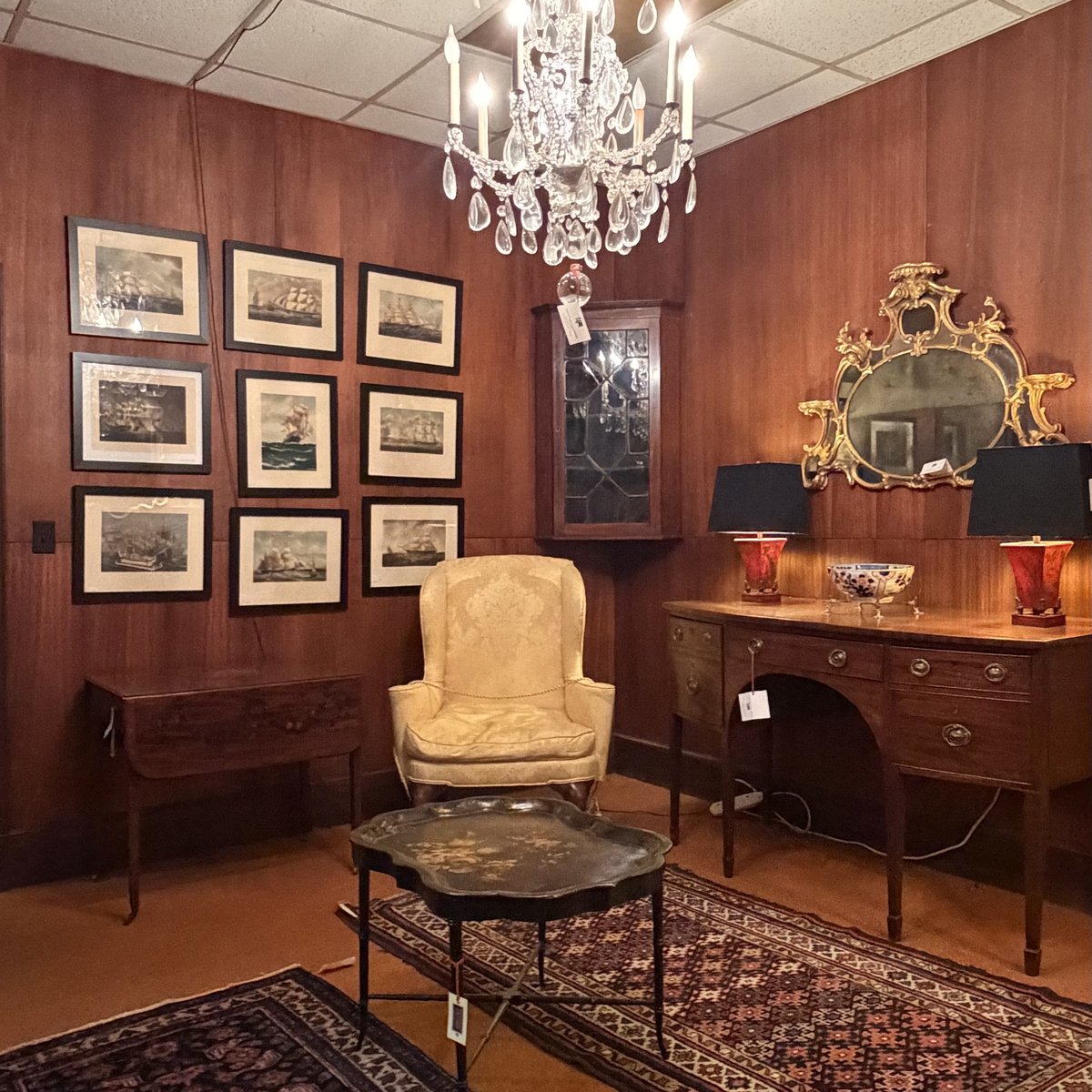 Antique furniture and decorative pieces on the floor at Savannah Galleries, East Bryan Street