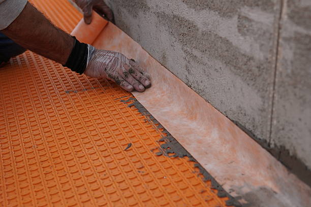 Waterproofing membrane installed beneath tile